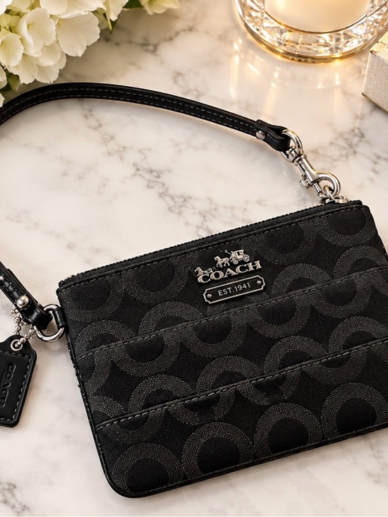 Coach Handbags - Coach Black Signature Wristlet Clutch with Silver Hardware